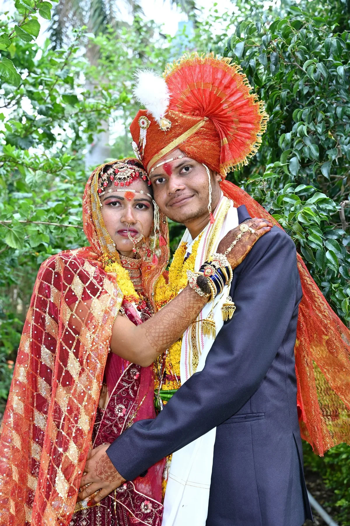 Bride and groom in a colourful outdoor wedding portrait